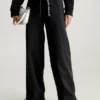 Calvin Klein Logo Tape Wide Leg Joggers 1 Calvin Klein Logo Tape Wide Leg Joggers -Everywear Shop J20J221916 BEH main