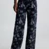 Calvin Klein 90's Loose All-Over Logo Jeans